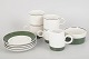 Olle Alberius for Rörstrand, set of four coffee cups with saucers, sugar bowl and creamer.