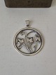 Vintage silver pendant decorated with bell flowers