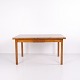 Osted Antik & Design presents: Danish Walnut Extension Dining Table by Cabinetmaker from the 1940s