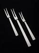 L'Art presents: Georg Jensen Bernadotte, set of three cold meat forks.