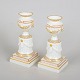 L'Art presents: Royal Copenhagen, set of two Flora Danica candlesticks.