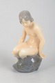 L'Art presents: Adda Bonfils for Royal Copenhagen, girl on rock.