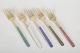 L'Art presents: A. Michelsen, set of five cake forks in gilt sterling silver and enamel.