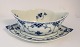 Lundin Antique presents: Royal Copenhagen. Blue fluted, half lace. Sauce bowl. Model 587. Length 23.5 cm. (1 ...