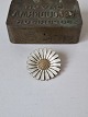 Karstens Antik presents: Anton Michelsen Marguerite brooch in gold-plated sterling silver with guilloché enamel.