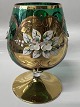 Cognac shot glass with green floral motif.Height 12.0 cm.