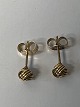 Knot earrings in 14 carat gold.