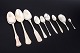 L'Art presents: Collection of nine silver and silver-plated serving spoons.
