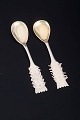 L'Art presents: Pair of Swedish Sámi spoons in gilt 830 silver.