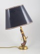 Spanish pistol table lamp in brass and wood.