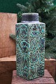 K&Co. presents: Royal 4 cornered faience Baca vase designed by Nils Thorsson from Aluminia with green / black ...