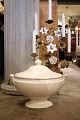 K&Co. presents: Large, decorative oval French 19th century cream-colored earthenware tureen...