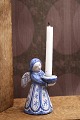 K&Co. presents: L. Hjorth ceramic angel with blue glaze holding a small candle. No.421.H: 9.5cm.