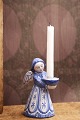 K&Co. presents: L. Hjorth ceramic angel with blue glaze holding a small candle. No.421.H: 9.5cm. Small chip ...
