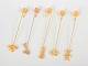 L'Art presents: Andreas Mikkelsen for Georg Jensen, set of five Golden Christmas candleholders.