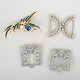 Set of one belt buckle and three brooches.