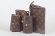 L'Art presents: Louis Vuitton, two key holders, wallet and pochette.