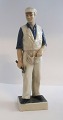 Lundin Antique presents: Royal Copenhagen. Carpenter. Model 4535. Height 23 cm. (1 quality)