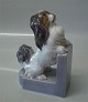Dahl Jensen figur
1109 Pekingeser bogstøtte 17 cm