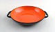 Krenit bowl and two dishes by Herbert Krenchel. Black metal and orange enamel.
