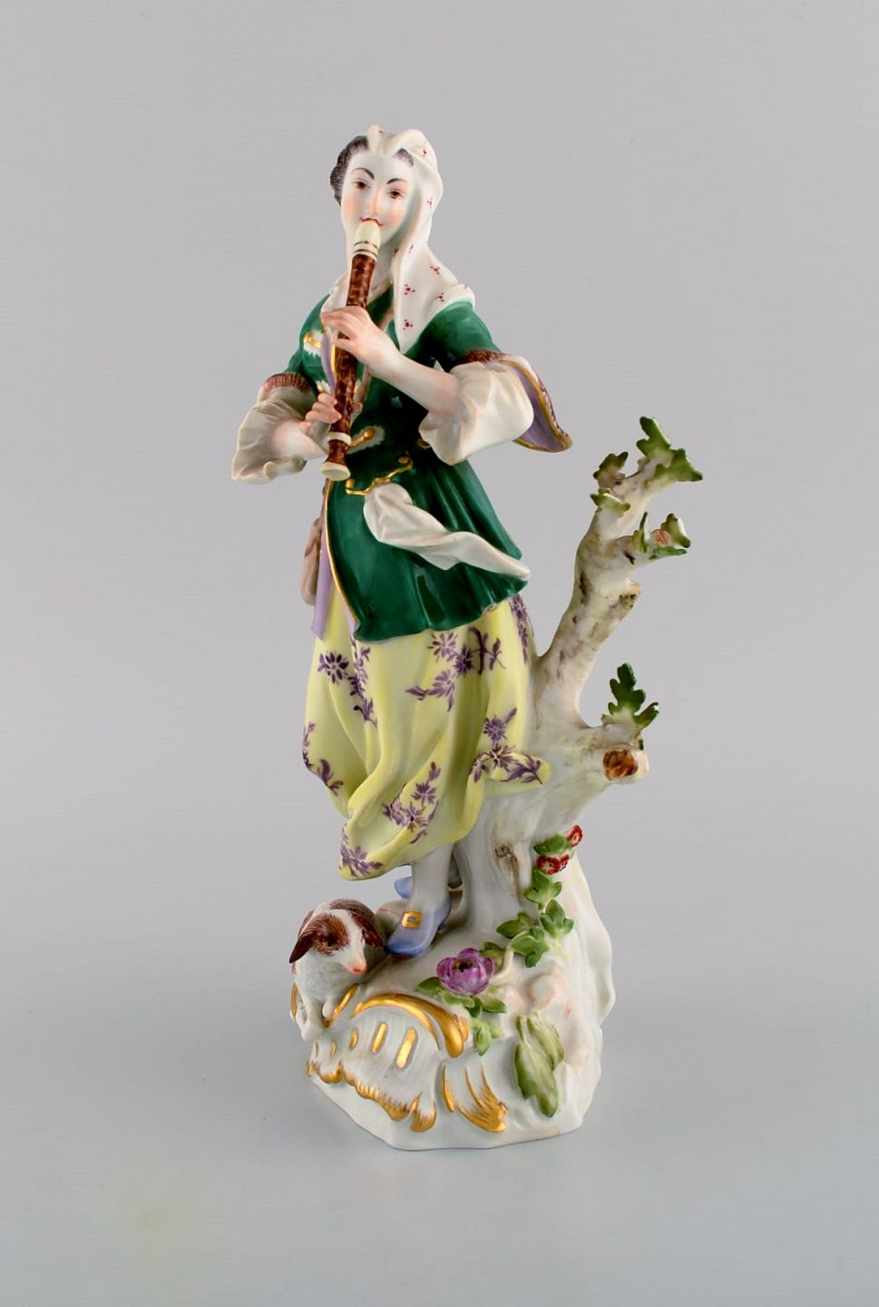  Antique Meissen porcelain figurine. Woman