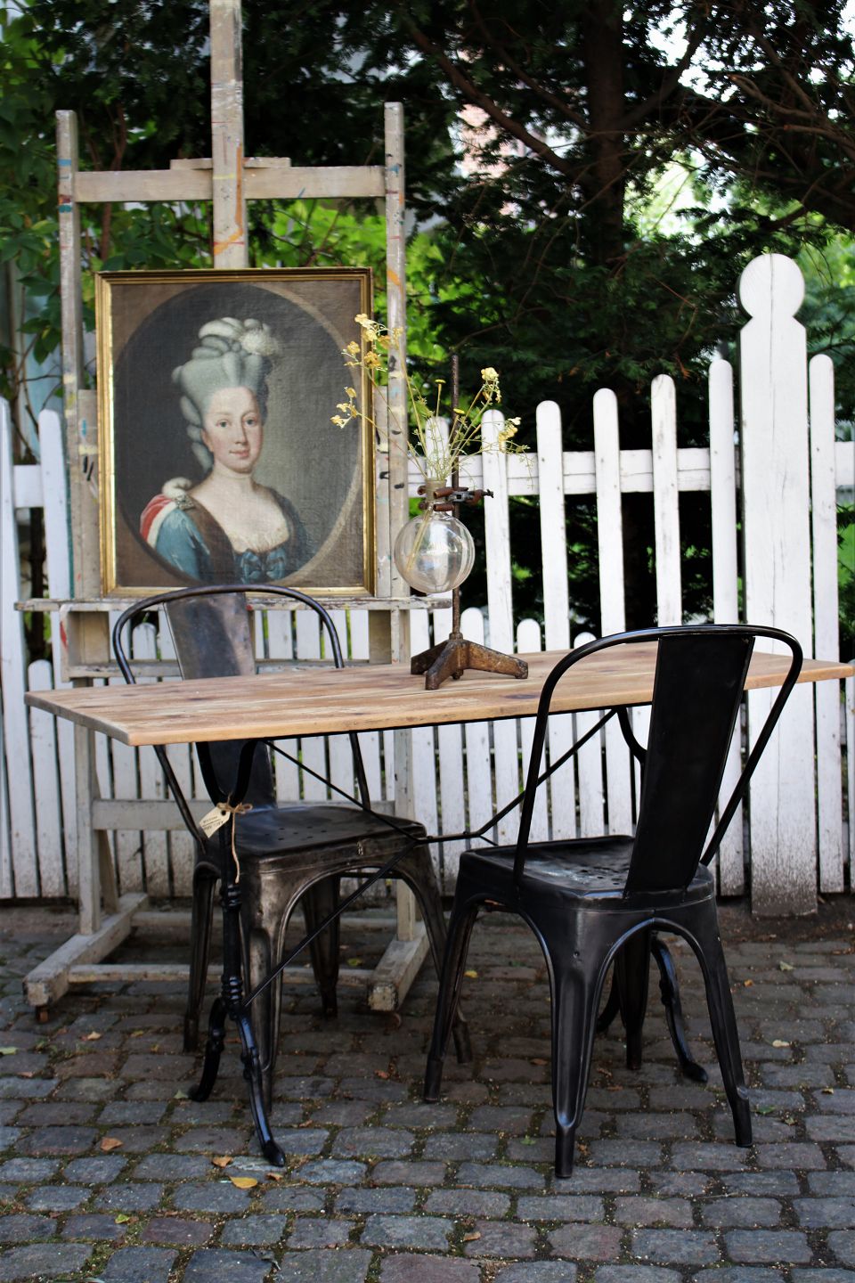 K Co Old French bistro table with black iron base and old wooden