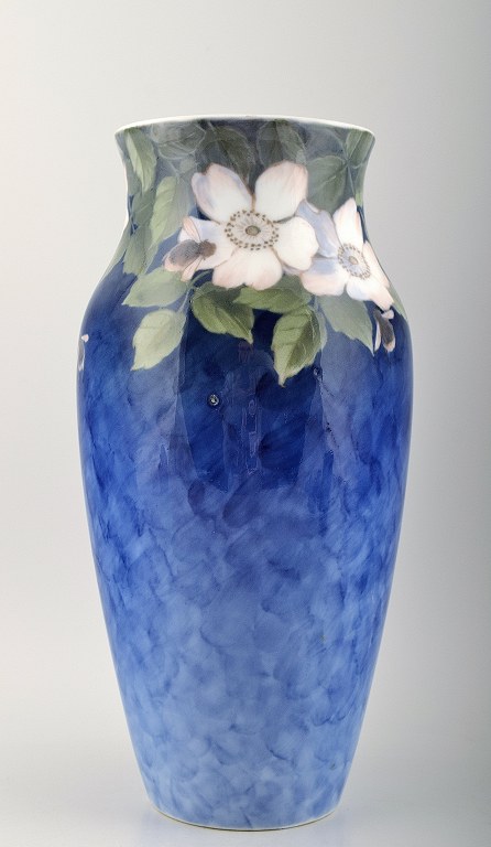 Royal Copenhagen vase decorated with flowers.
