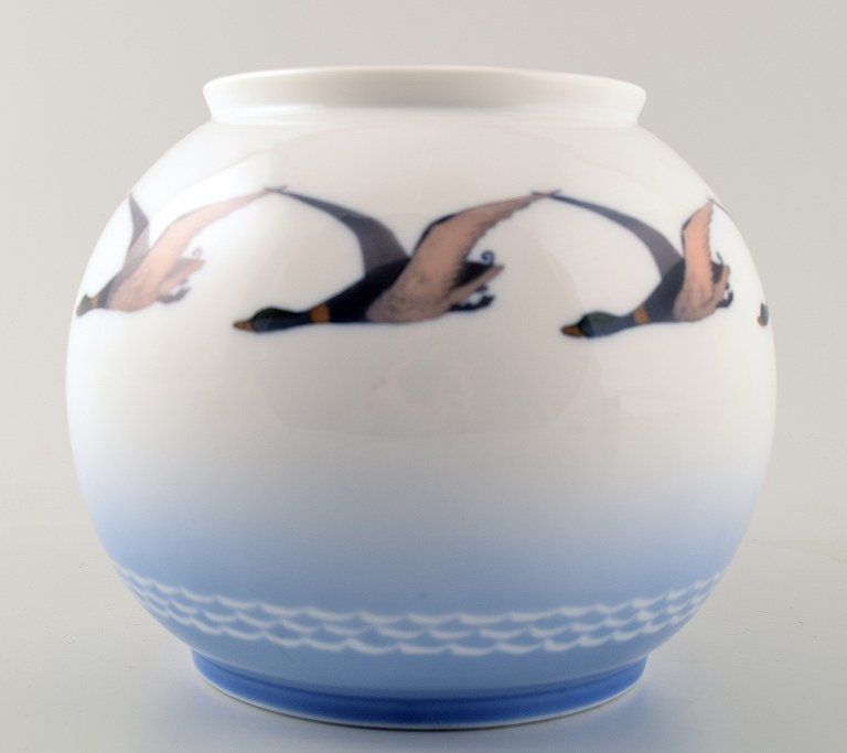 Royal Copenhagen vase decorated with ducks in flight.
