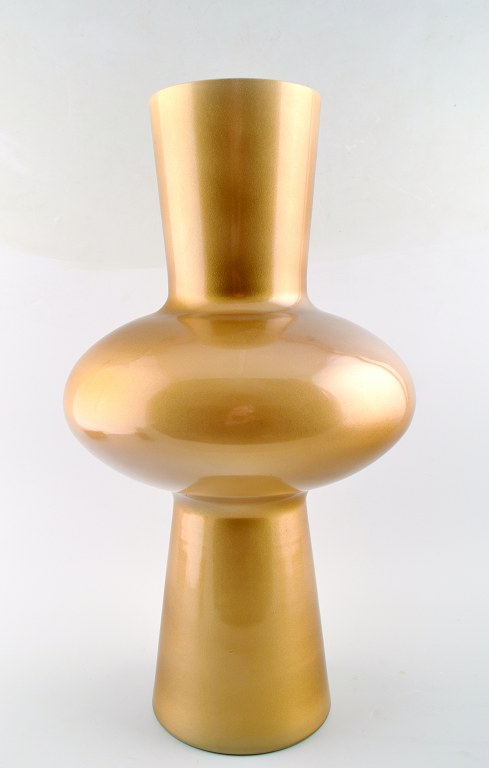 Large art glass vase with gold decoration.
