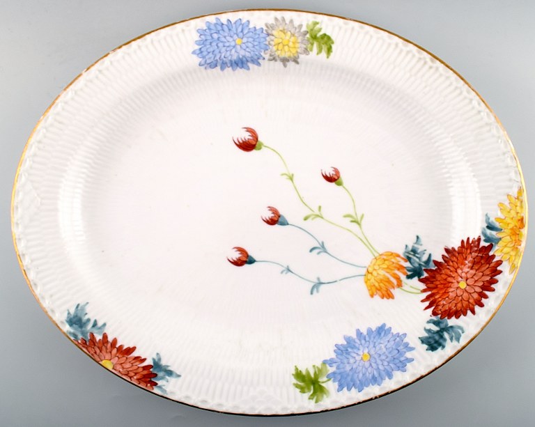 Antique and rare Royal Copenhagen large dish decorated with flowers.
