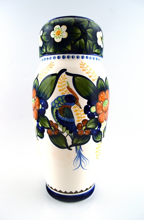 Aluminia/Royal Copenhagen large vase, hand painted with a bird and floral 
motifs.