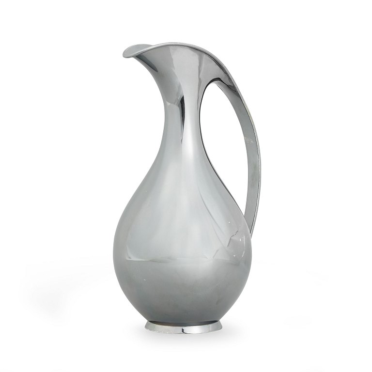 Kay Fisker 1893-1965. Beak jug in sterling silver, pear-shaped body with curved handle.