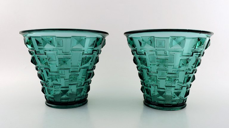 SIMON GATE for Orrefors, A pair of green Art Deco art glass vases.
