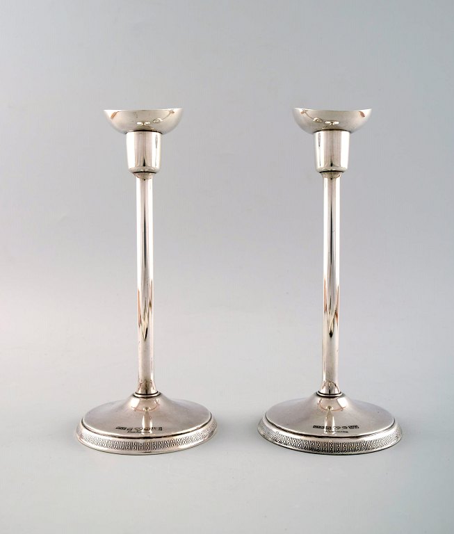 Ainar Axelsson for GAB (Guldsmedsaktiebolaget) a pair of modernist silver 
candlesticks.