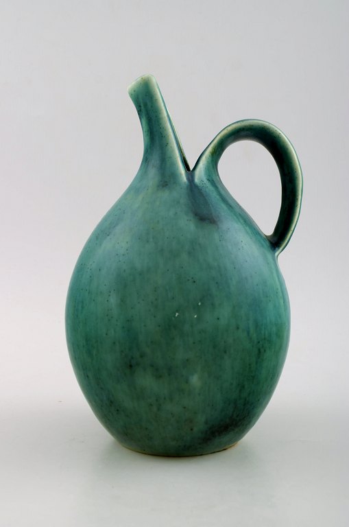 Eva Stæhr-Nielsen, Saxbo: pitcher in stoneware.
Decorated with glaze in green shades.