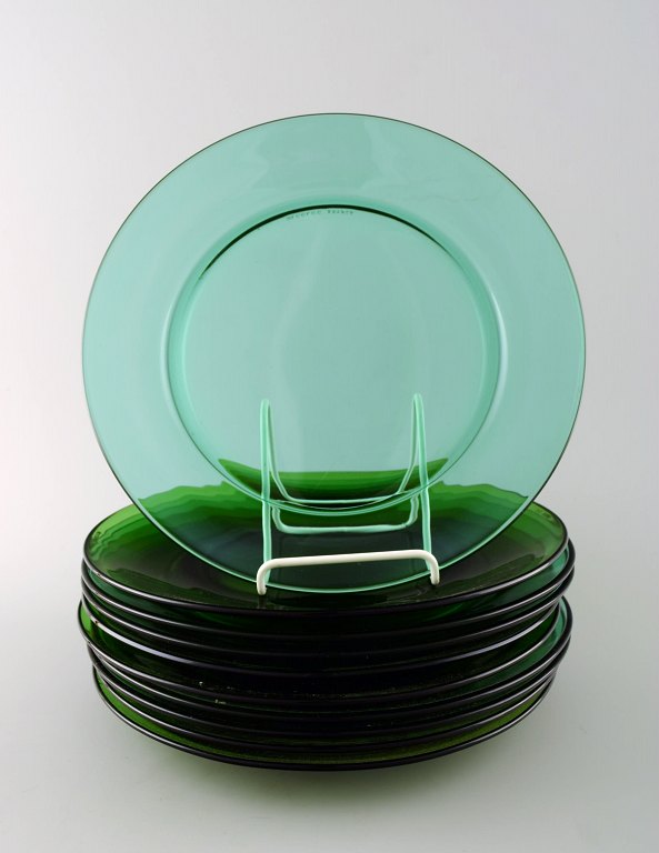 Vereco, France, 10 plates in green art glass.

