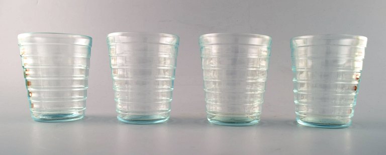 Kaj Franck (Finnish, 1911-1989) Nuutajärvi Glass Works, Finland, art glass. Four 
drinking glasses in clear glass.