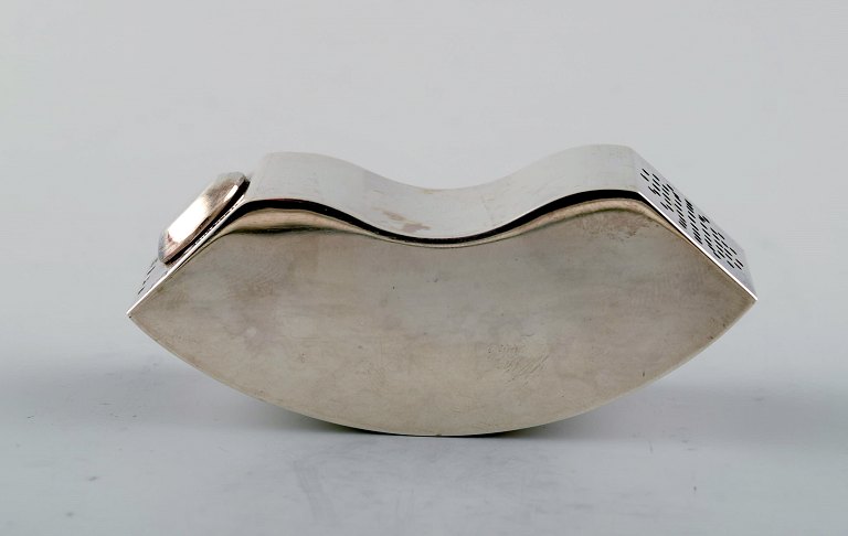 Josefine Davidsson, Swedish silversmith, workshop in Stockholm.
Modernist saltshaker of sterling silver. 2000s.