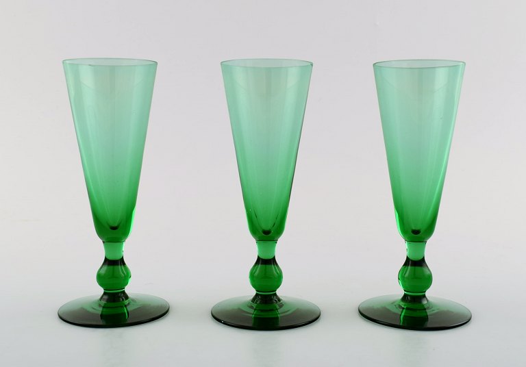 SIMON GATE for Orrefors, A set of three green art glass.