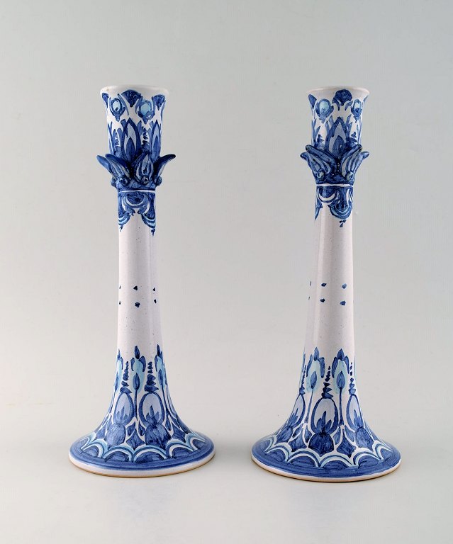 A pair of rare Bjørn Wiinblad unique ceramic candlesticks.
