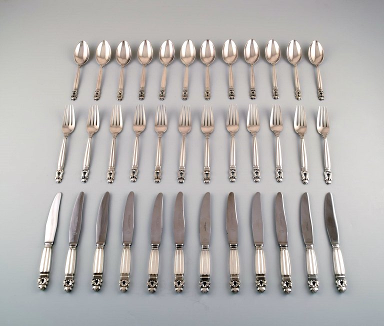 Georg Jensen "Acorn" Complete luncheon service for twelve people. Sterling 
silver.