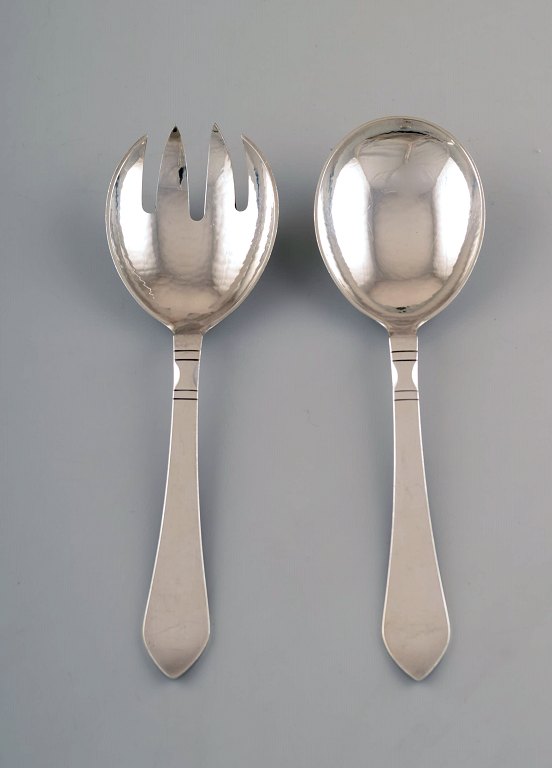 Georg Jensen. Continental salad set in full silver, silverware, hand hammered.