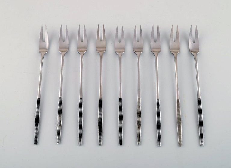 Set of nine herring forks/serving forks, Jens H. Quistgaard "Variation VI" 
cutlery of handmade stainless steel.