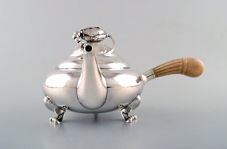 Georg Jensen "Blossom" teapot of hammered sterling silver. 
