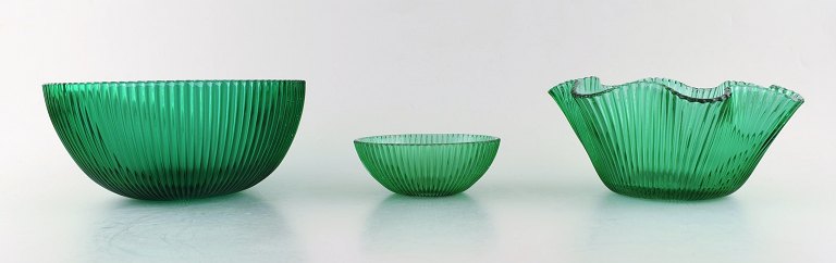 Arthur Percy for Nybro Sweden. 3 bowls in green art glass. Fluted design.
