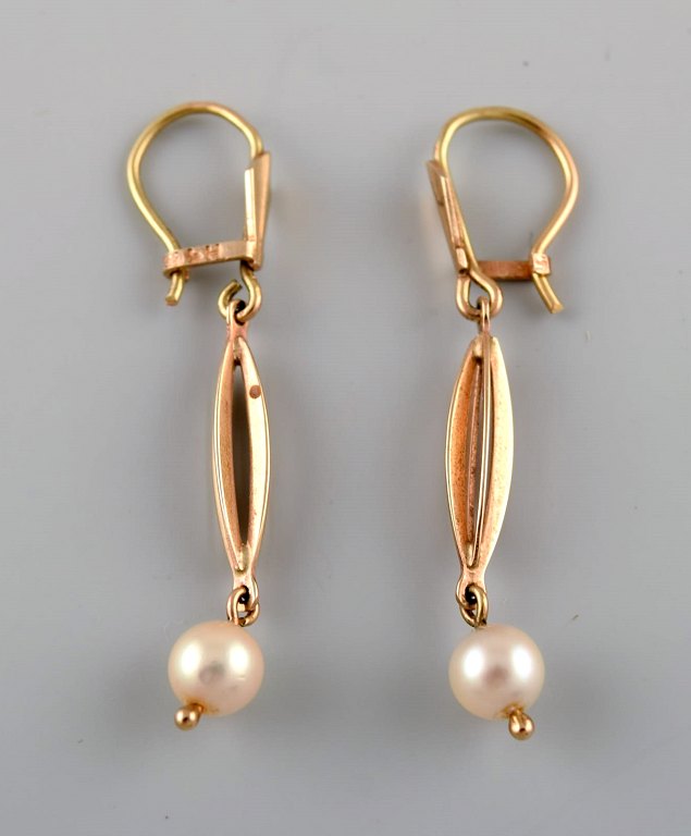 Danish 14K gold studs with Akoya saltwater culture pearls. Mid-1900s.
