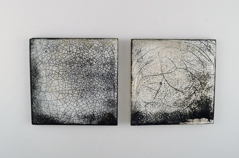 Svend Hammershøi for Kähler, HAK. 2 glazed stoneware tiles in beautiful gray 
black double glaze. 1930