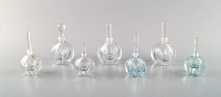 Edward Hald for Orrefors. A collection of seven mouth blown art deco flacons in 
art glass. Designed in the 1940
