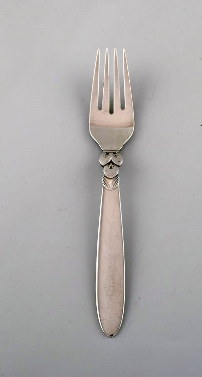 Early Georg Jensen "Cactus" breakfast fork in sterling silver. Dated 1933-44. 
Eight pieces in stock.