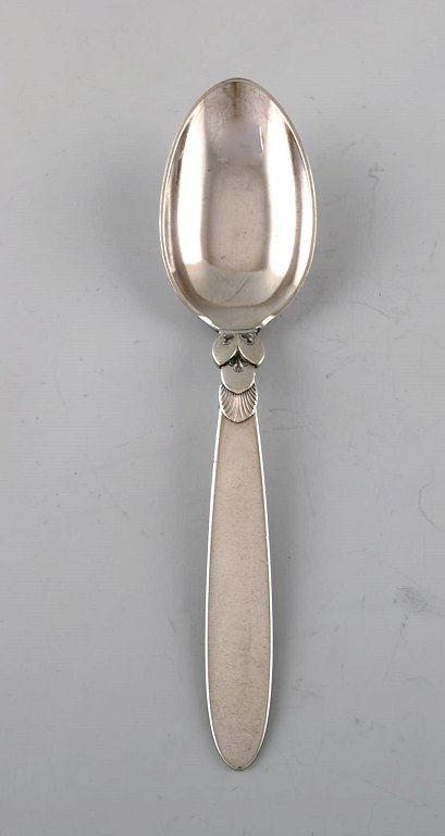 Early Georg Jensen "Cactus" dessert spoon in sterling silver. Dated 1915-30. Ten 
pieces in stock.